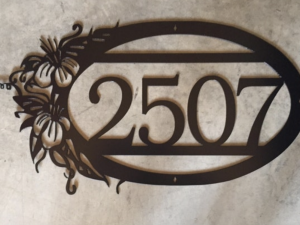 Metal house number, oval floral