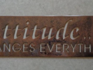 Metal sign, Attitude Changes Everything