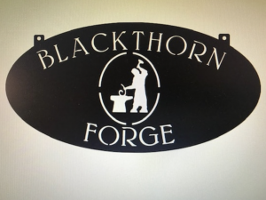 Metal BLACKSMITH sign with BLACKSMITH and HAMMER