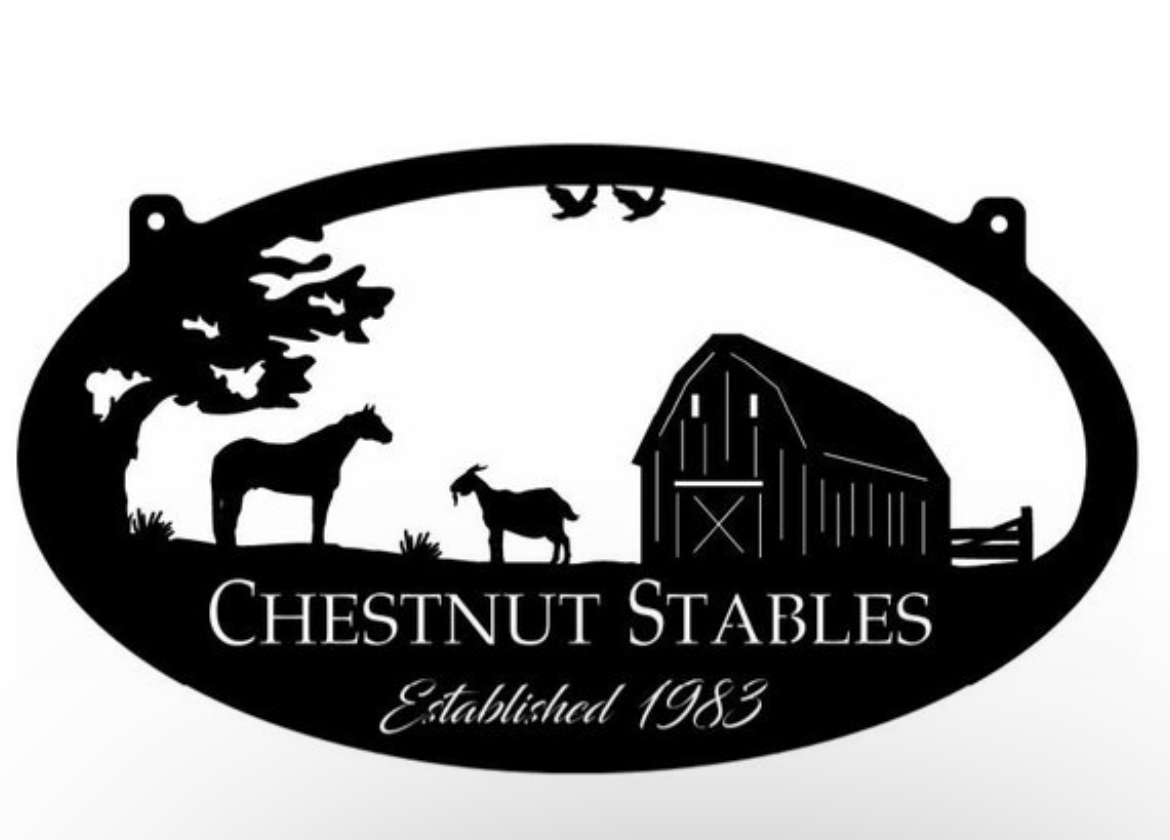 Metal sign with goat, horse and barn