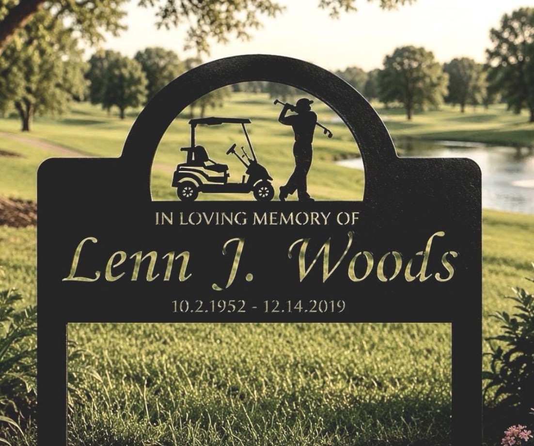 In MEMORY sign with Golf cart and Golfer