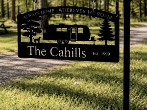 Metal Airstream camper sign with dog and camper